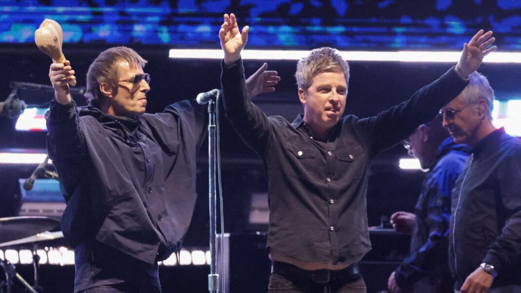 Oasis confirms second leg of reunion tour after weeks of social media teasers Liam and Noel Gallagher of Oasis with their arms outstretched accepting applause from the audience at the Rose Bowl Stadium in Pasadena, California in September 2025