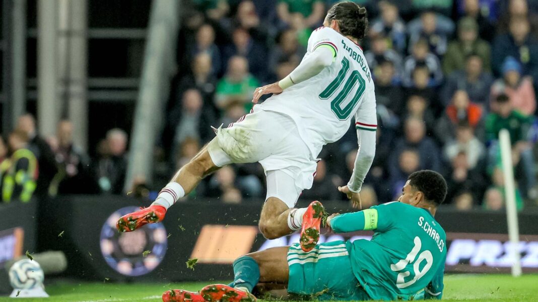 Shea Charles tackles Dominik Szoboszlai