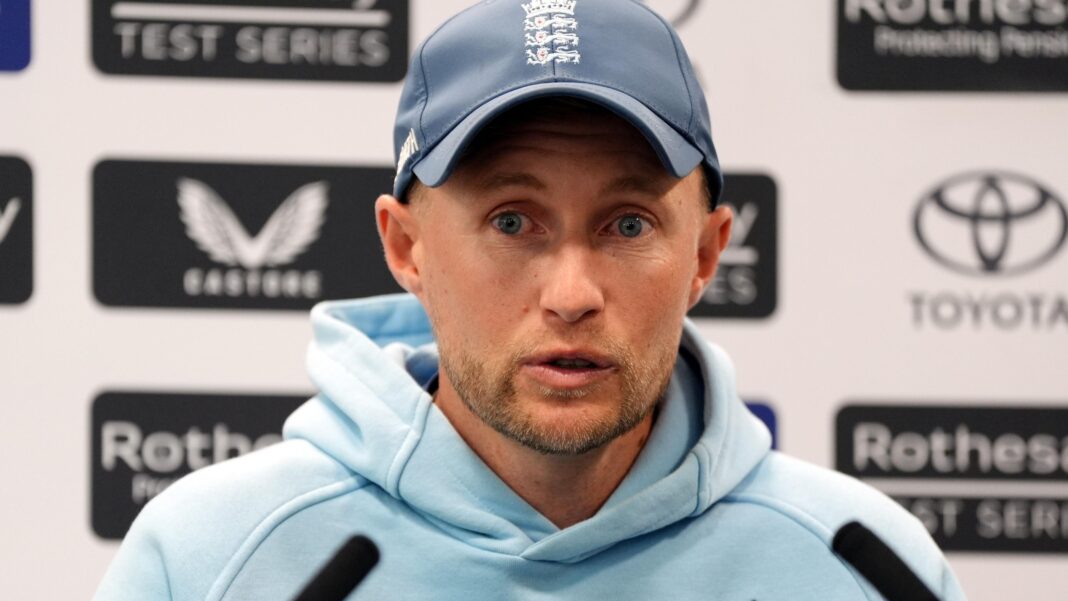 Carse assault investigation dropped by police Joe Root speaks to the media with sponsors boards behind him