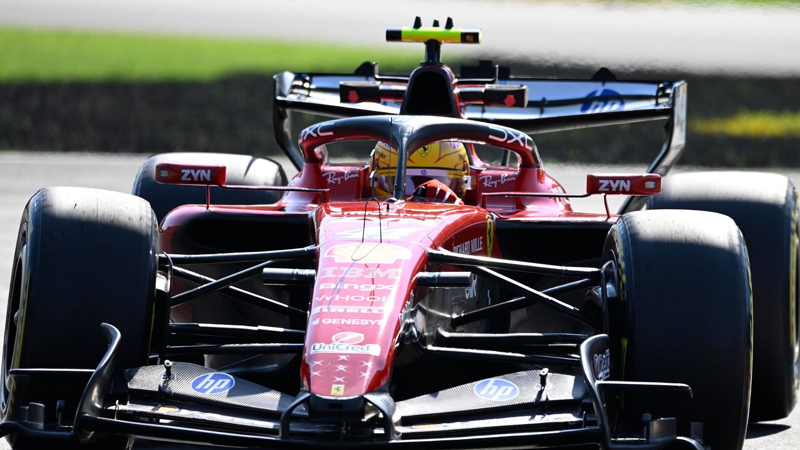 A close-up of Lewis Hamilton driving the Ferrari during Friday practice for the Italian Grand Prix
