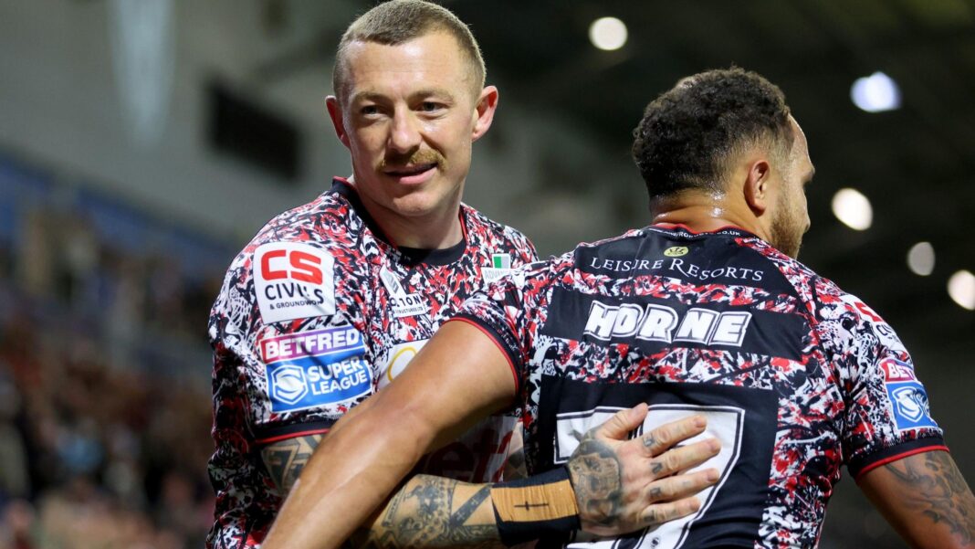 Josh Charnley celebrates a try
