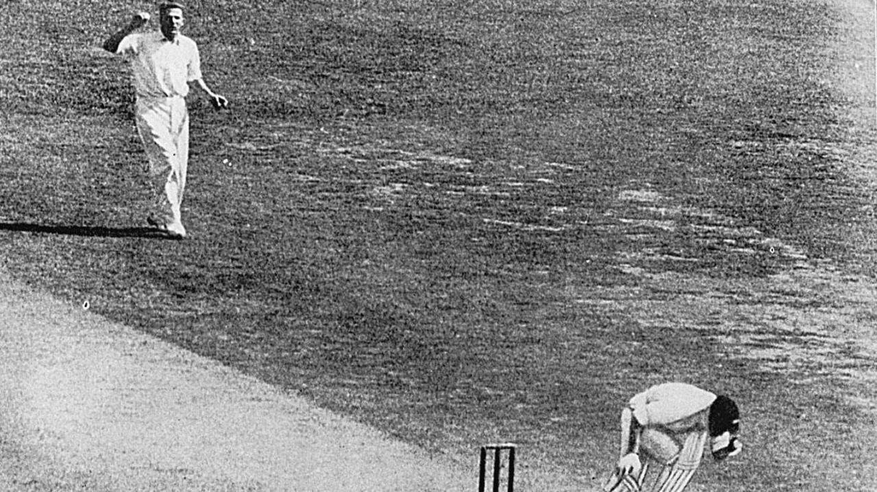 Harold Larwood strikes Australian wicketkeeper Bert Oldfield in the head with a bouncer during the third day of the the Third Test at the Adelaide Oval in 1933