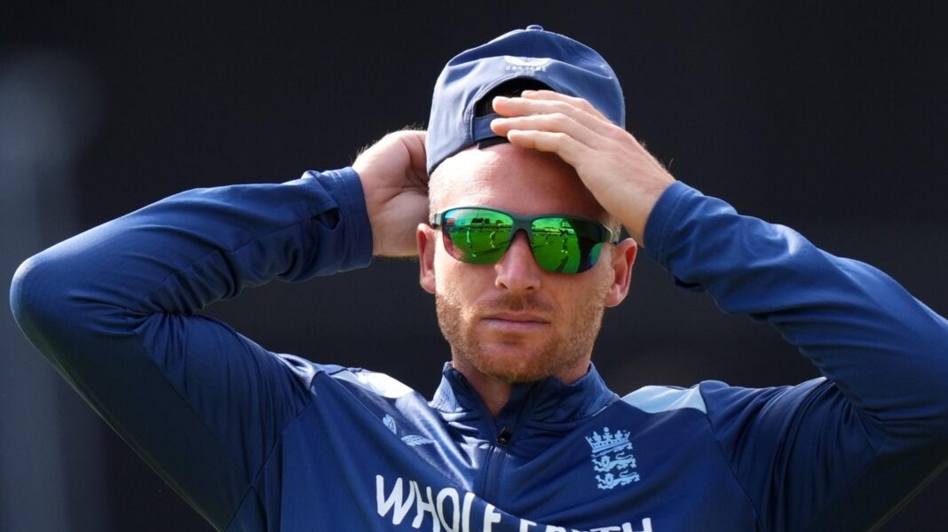 Buttler out of tri-series while England prepare central contracts Jos Buttler rubs his head, while wearing sunglasses and a cap