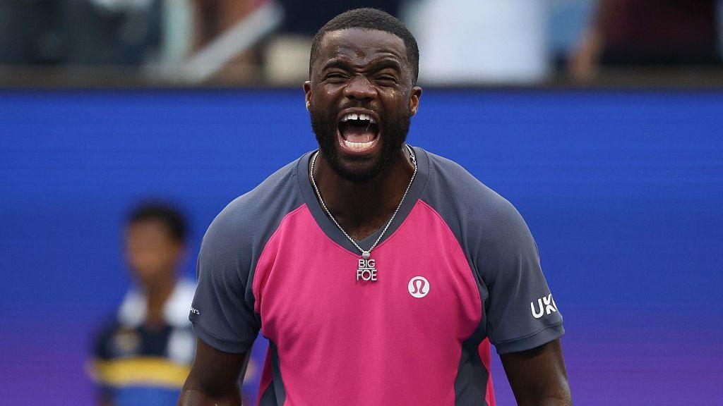 USA's Frances Tiafoe reacts after defeating Russia's Daniil Medvedev