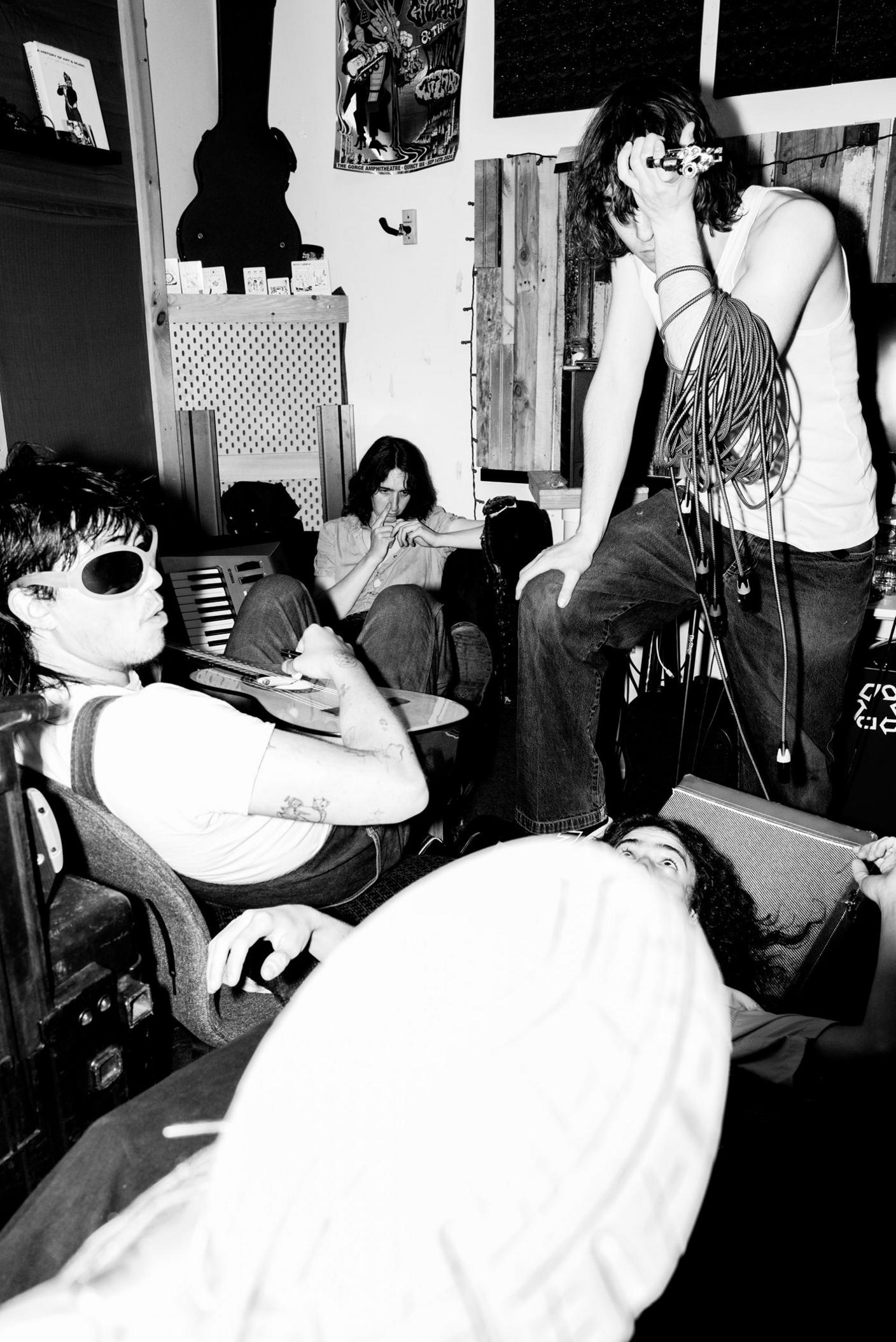 The New York band Geese pictured backstage. Black and white image.