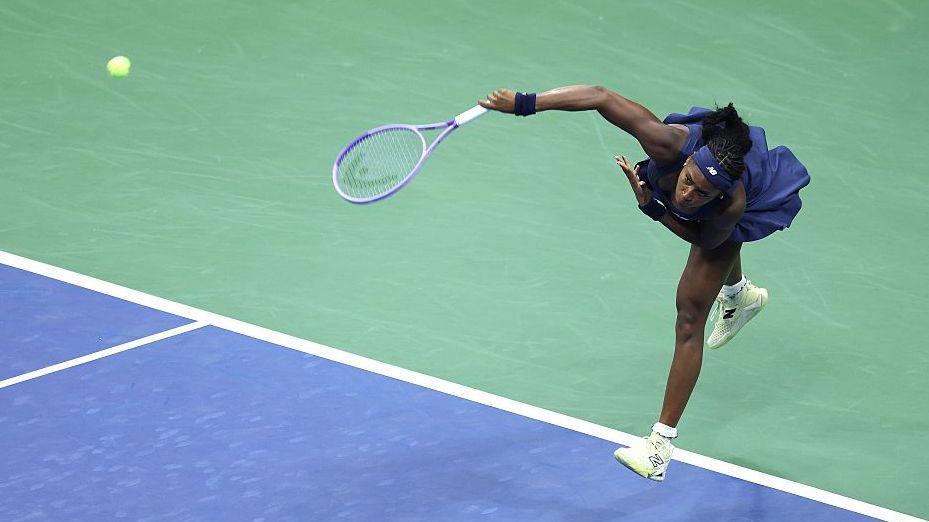 Coco Gauff hits a serve during her 2026 US Open match against Zeynep Sonmez