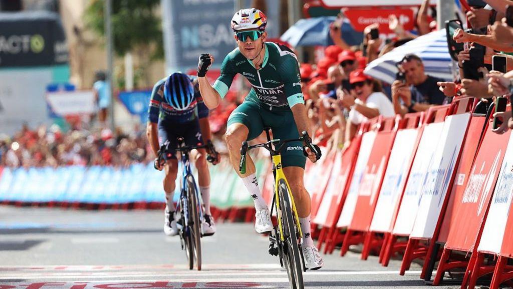 Van Aert powers to victory on stage 13 of Vuelta Wout van Aert celebrates