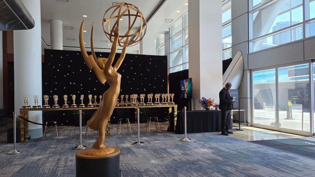 Memorable moments from the Emmys and everything you couldn’t see on TV A large Emmy statue marks an entrance to a building. A table sits in the background with dozens of small gold trophies