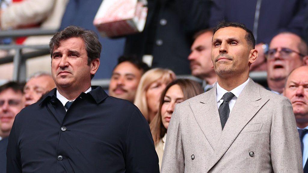 Manchester City CEO Ferran Soriano and chairman Khaldoon Al Mubarak watch on from the stands ahead of kick-off at the 2026 FA Cup final at Wembley Stadium, London