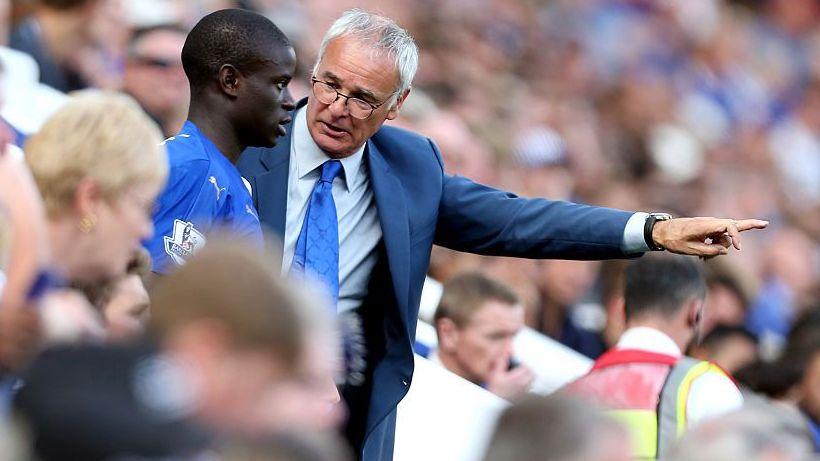 N'Golo Kante looks on Claudio Ranieri points