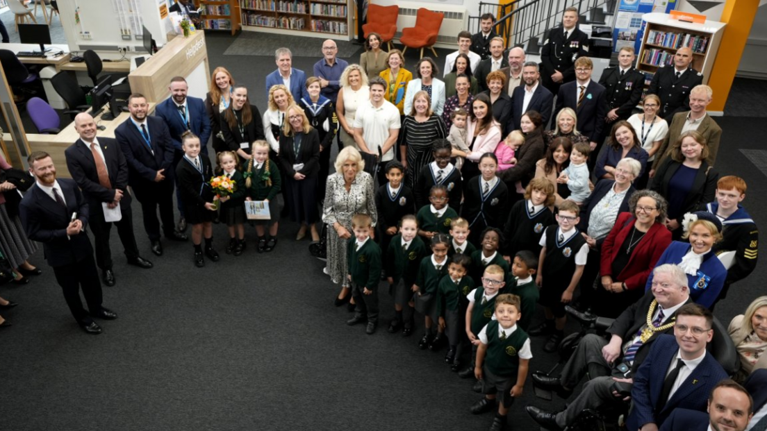 Staff, students and dignatories with the Queen viewed from on high