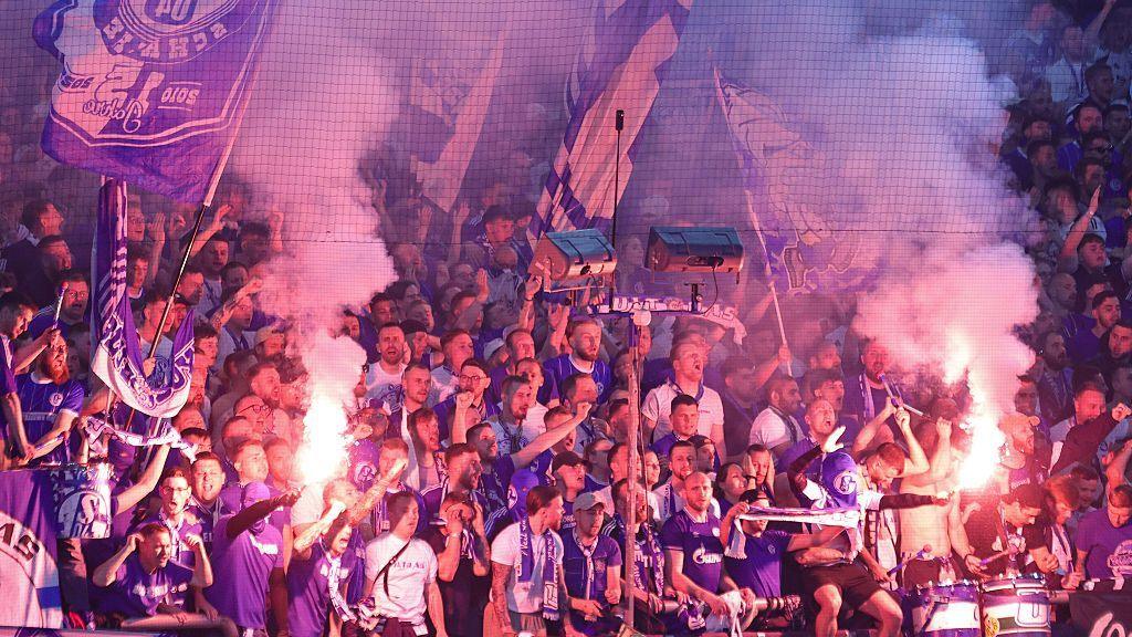 Schalke fans light flares