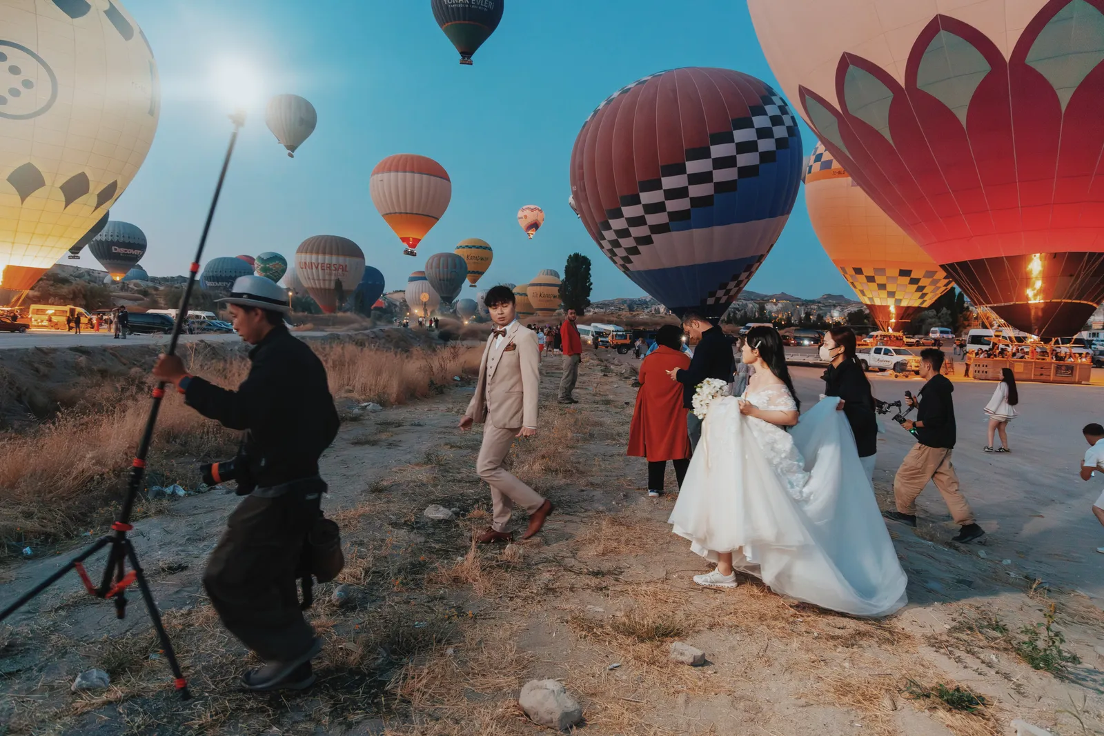 Image may contain Adult Person Wedding Balloon Child Clothing and Coat