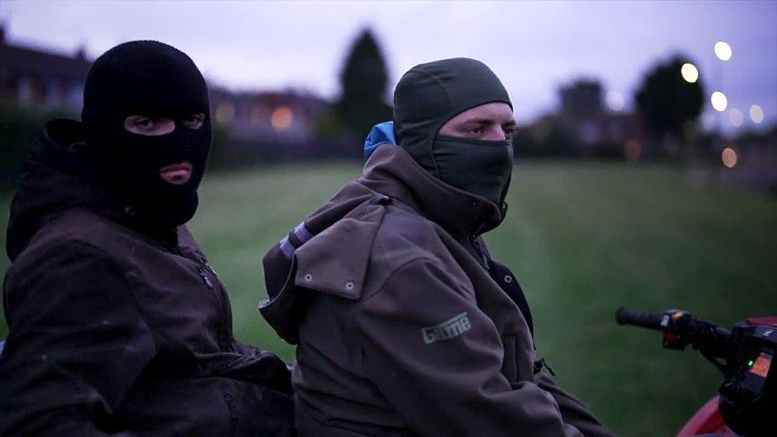 ‘I’d rather die than ring the police’: Distrust and fear in Middlesbrough after A66 crash Two young men wearing balaclavas sit on a red quad bike