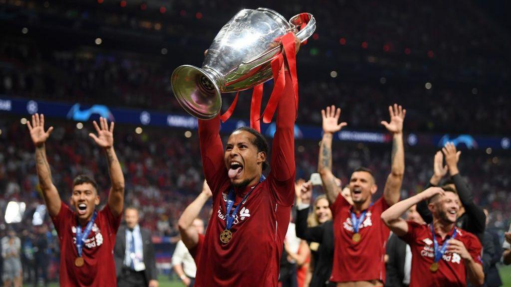 Virgil van Dijk lifts the Champions League trophy