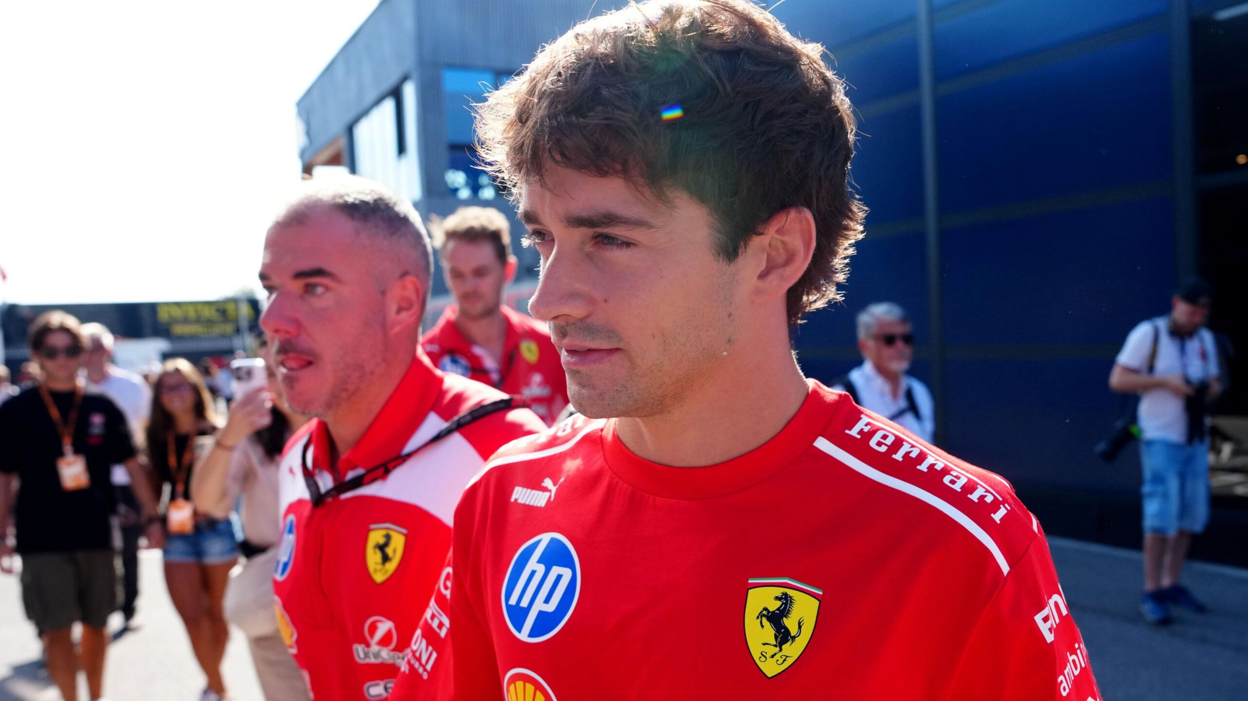 Ferrari's Charles Leclerc arrives at the Monza paddock on media day for the Italian Grand Prix