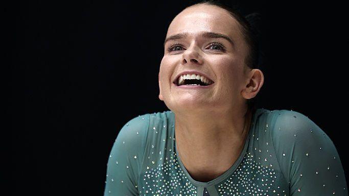 Alice Kinsella in a teal coloured leotard competing at the British Artistic Gymnastics Championship.