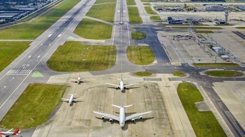Two planes landed at an airport.