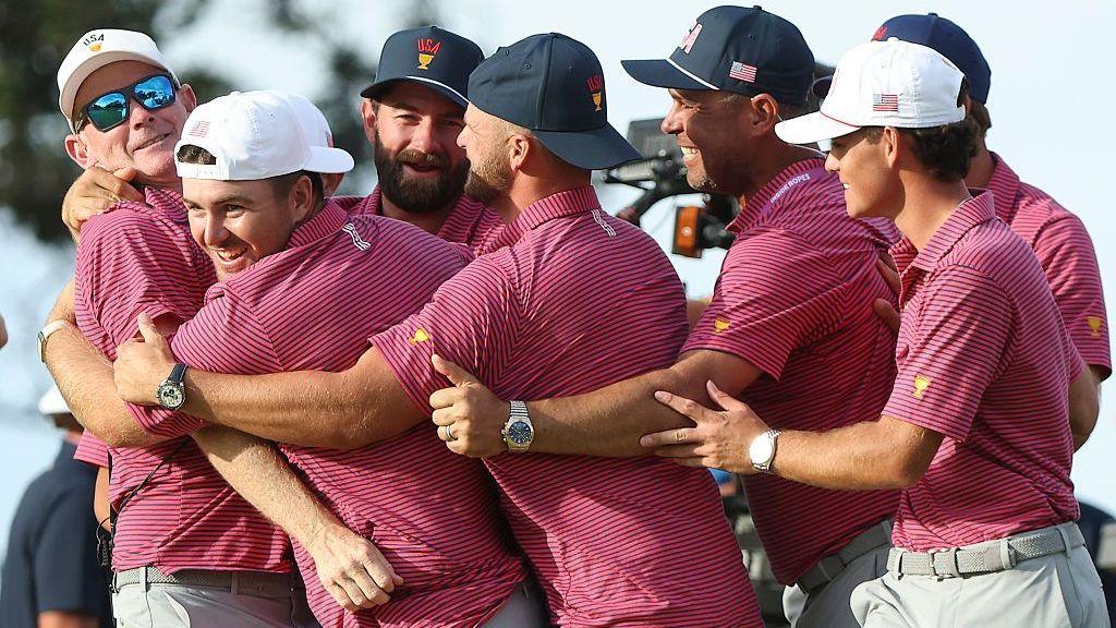 The US Presidents Cup team celebrating with captain  Brandt Snedeker