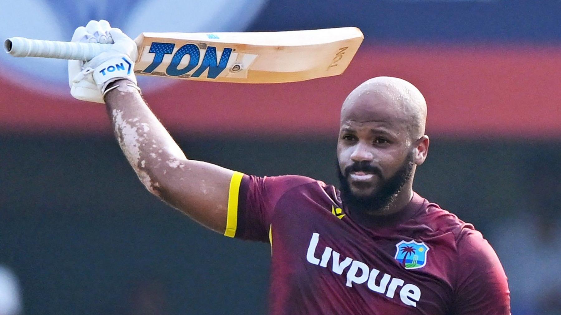 John Campbell raises his bat