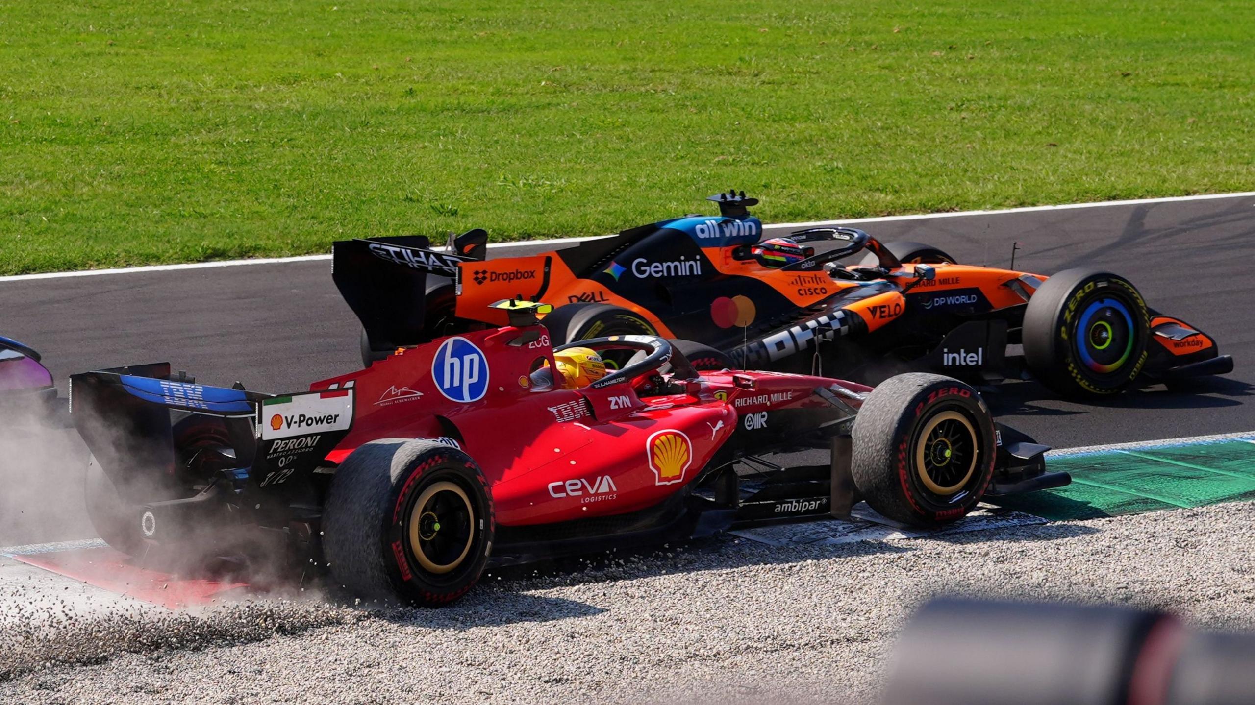 Lewis Hamilton goes into the gravel and loses places at the first chicane at Monza