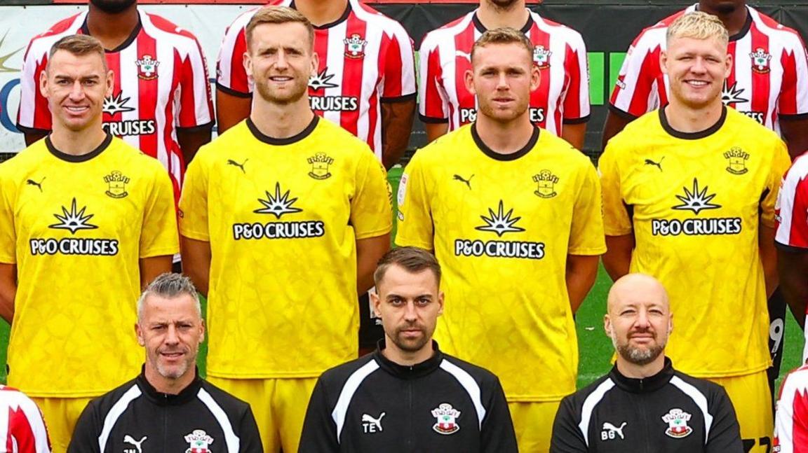 Aaron Ramsdale pictured back right in a Southampton football team photo wearing their yellow goalkeeping jersey