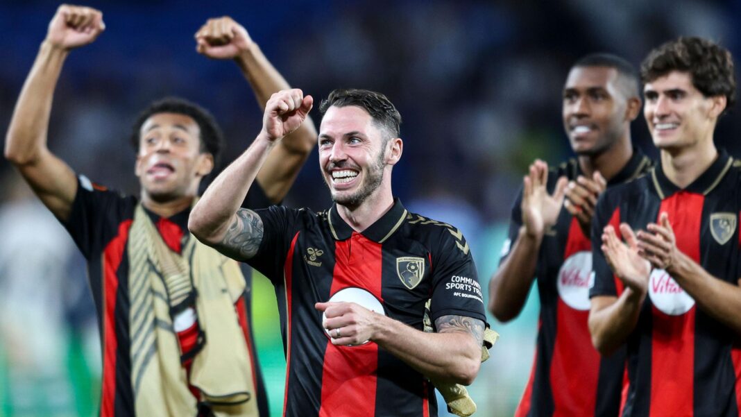 Adam Smith leads Bournemouth players celebrations after win at Real Sociedad