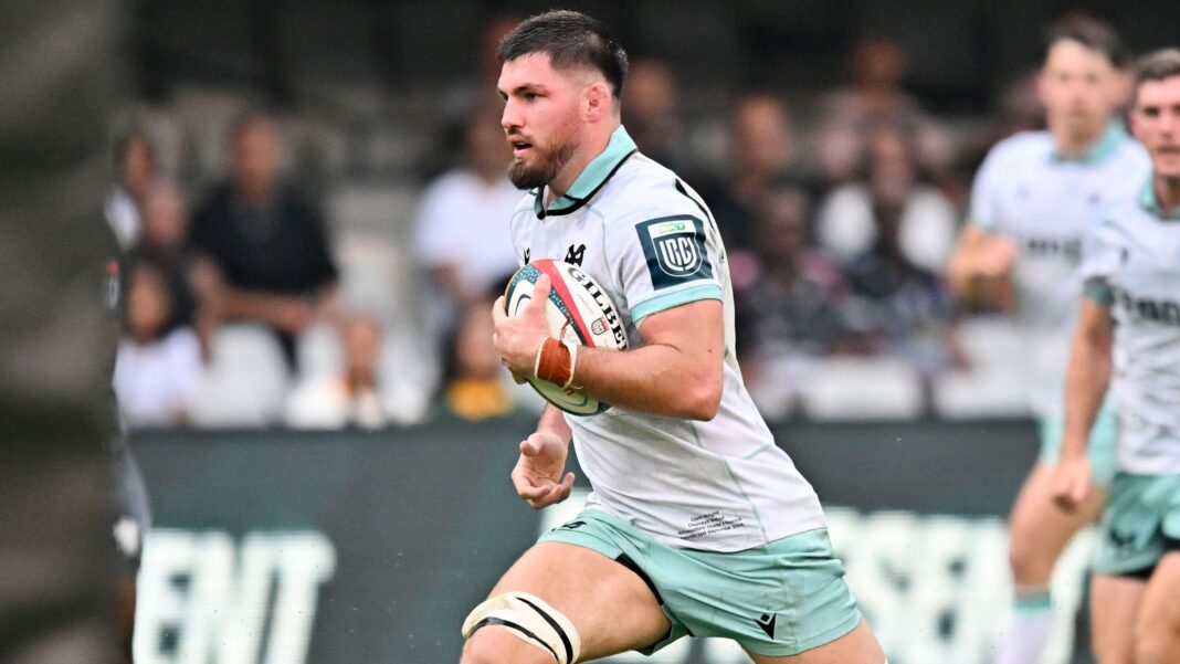 Liam Wright runs in a try for Ospreys at Sharks