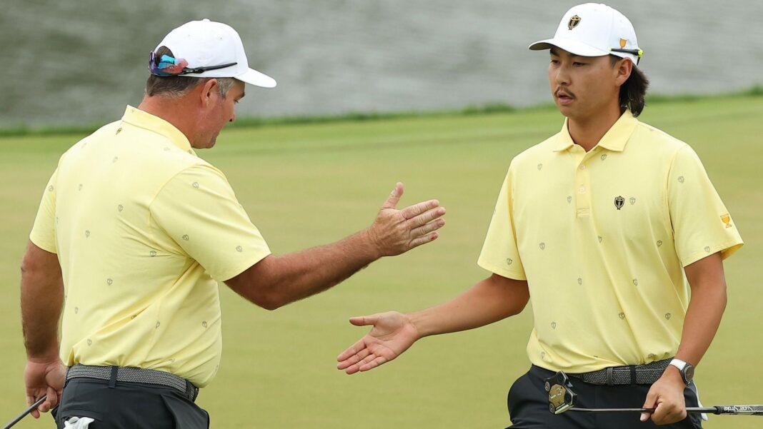 International team lead US in Presidents Cup Ryan Fox of New Zealand and the International Team and Min Woo Lee of Australia give each other a high five