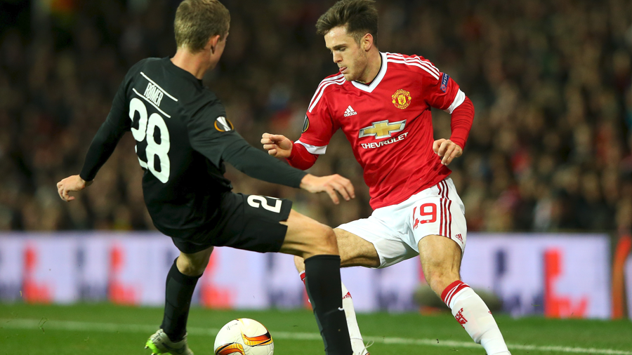 Manchester United's Joe Riley competes for the ball in the Europa League game against Midtjylland at Old Trafford in 2016