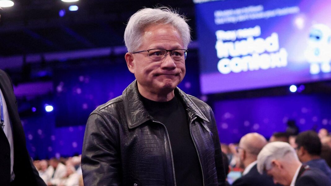Nvidia boss says AI ‘doesn’t need new laws’ as safety concerns grow Nvidia CEO Jensen Huang walking the floor at the Salesforce "Dreamforce" conference, wearing a black leather jacket and black t-shirt.