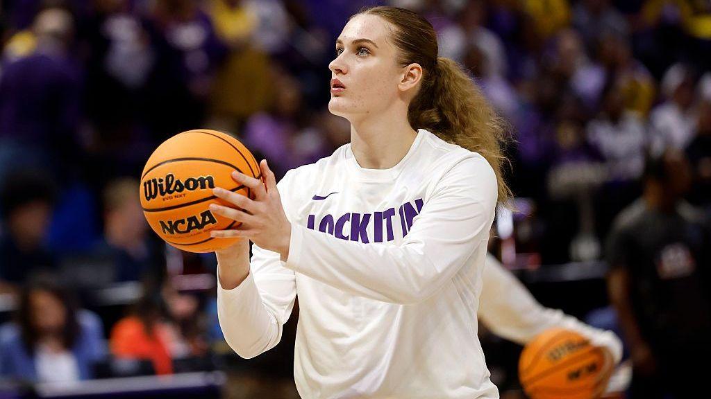 Kate Koval playing basketball for Louisiana State University