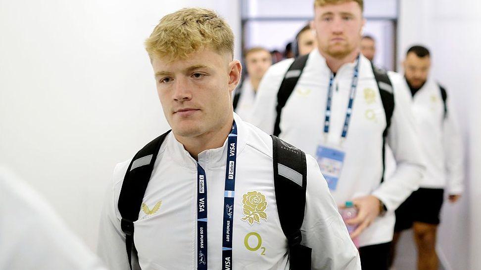 Fin Smith leads England to the dressing room