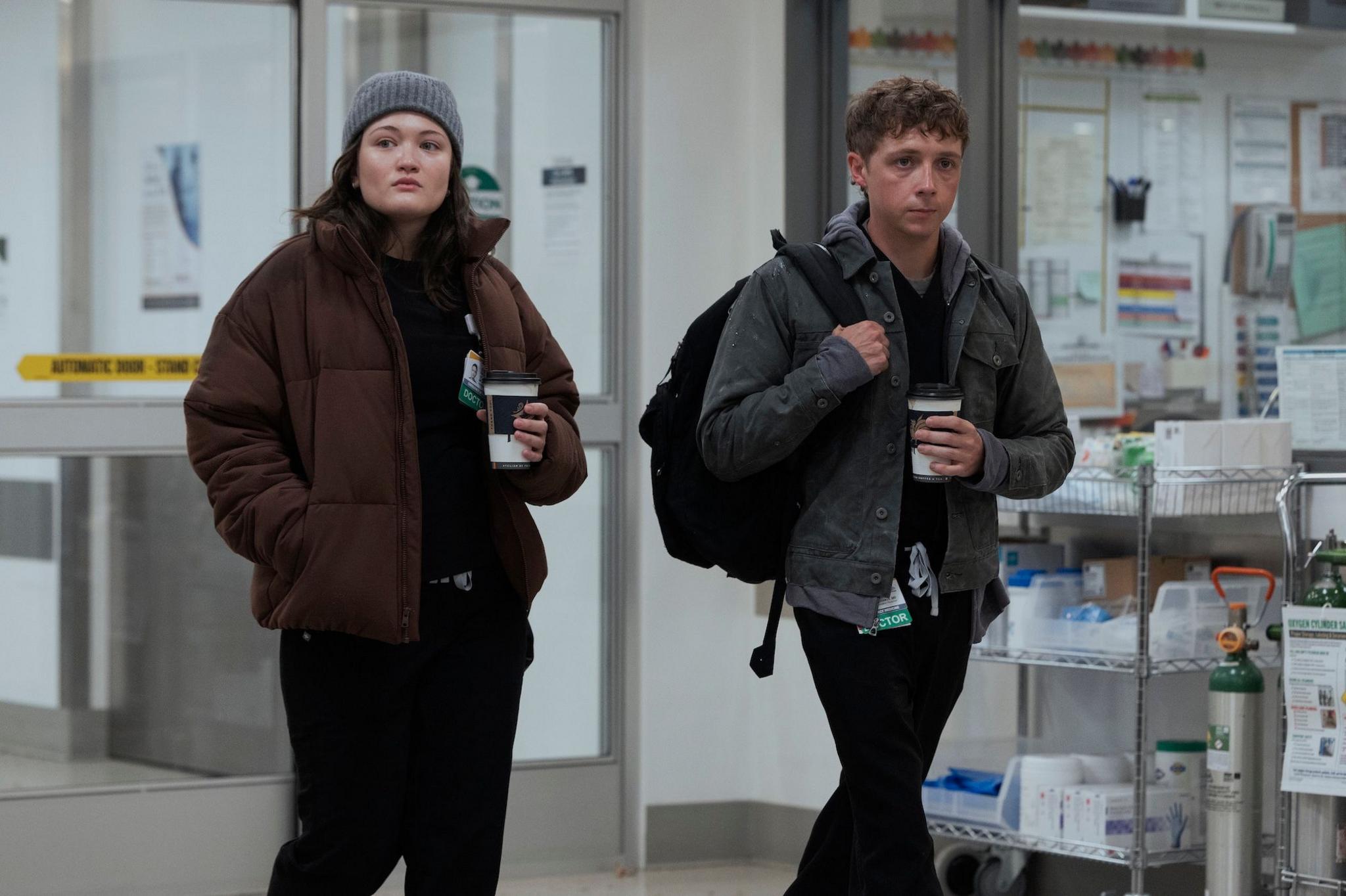 Picture of two medical staff holding coffees