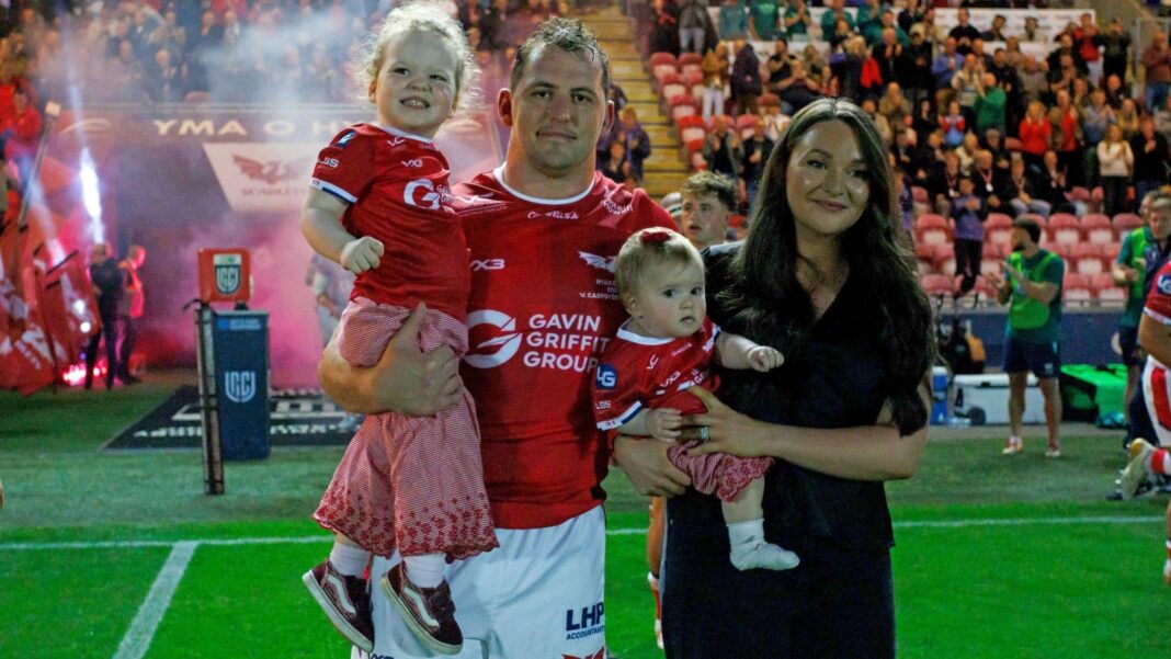 Ryan Elias walked out with his wife Meg and two children Hattie and Poppy before his 200th game for Scarlets