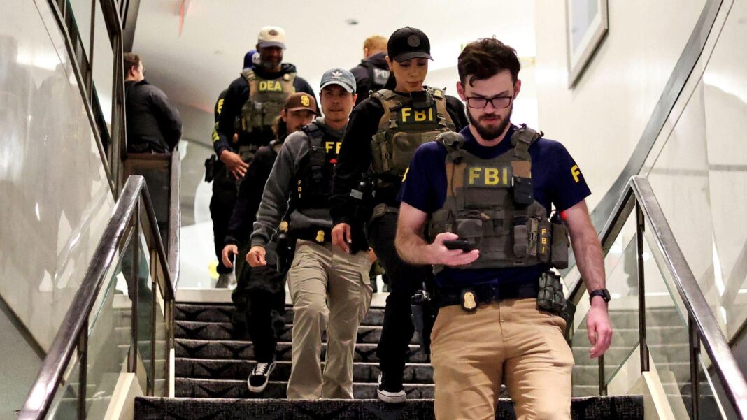 Man shot during 2024 Trump campaign rally in Butler dies FBI officers walk down a set of stairs wearing tactical gear during the shooting