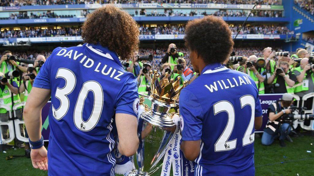 David Luiz and Willian pose with the Premier League trophy