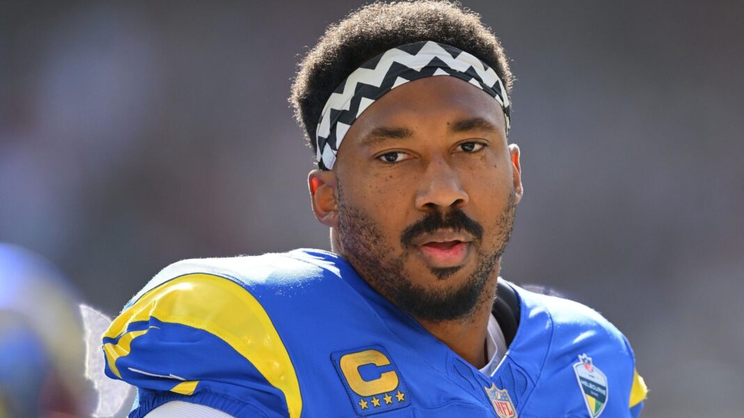 Los Angeles outside linebacker Myles Garrett looks on
