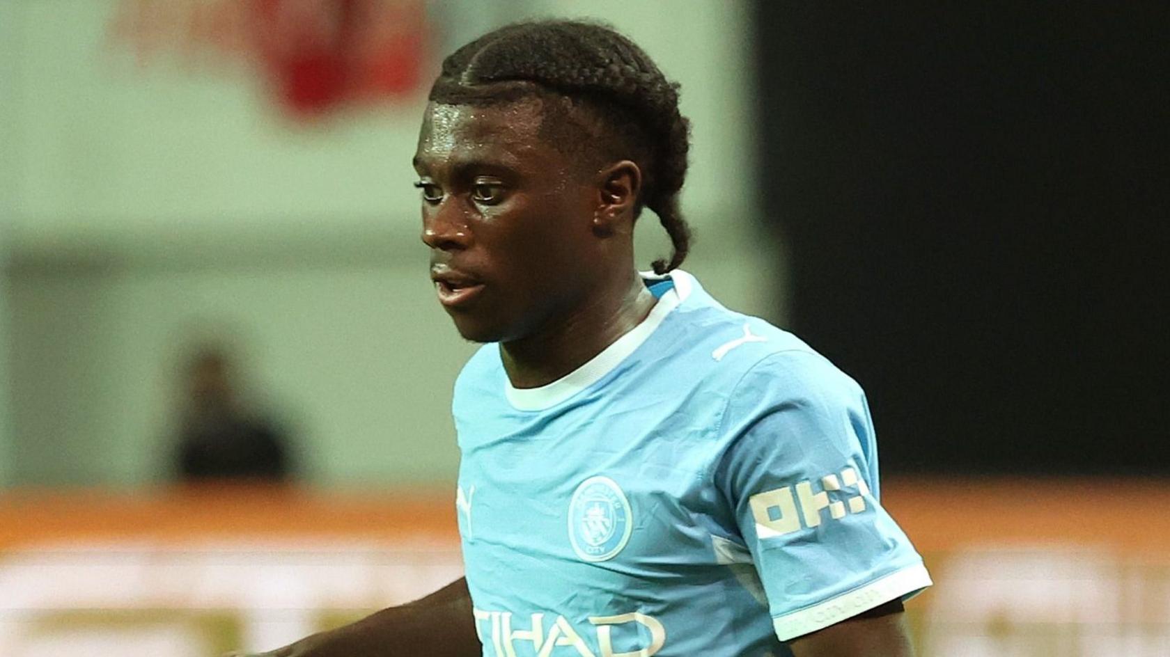 Jeremu Monga playing for Manchester City in pre-season
