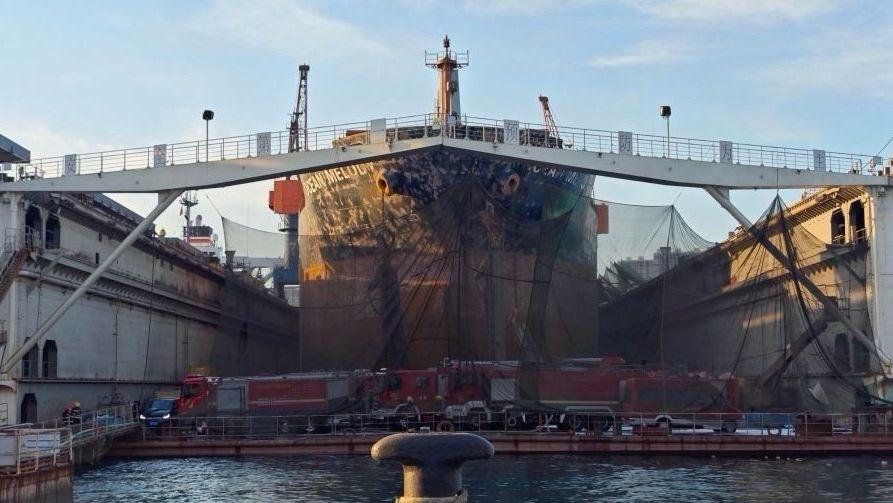 Large boat undergoing maintenance