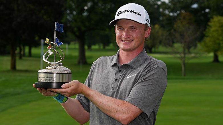Sandy Scott with the the Nationwide Children's Hospital Championship trophy