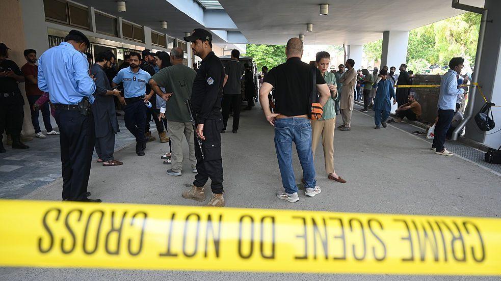 Security personnel and police officers are seen outside the Maternal and Child Health Ward at the Pakistan Institute of Medical Sciences (PIMS) in Islamabad, Pakistan, on August 26, 2026.