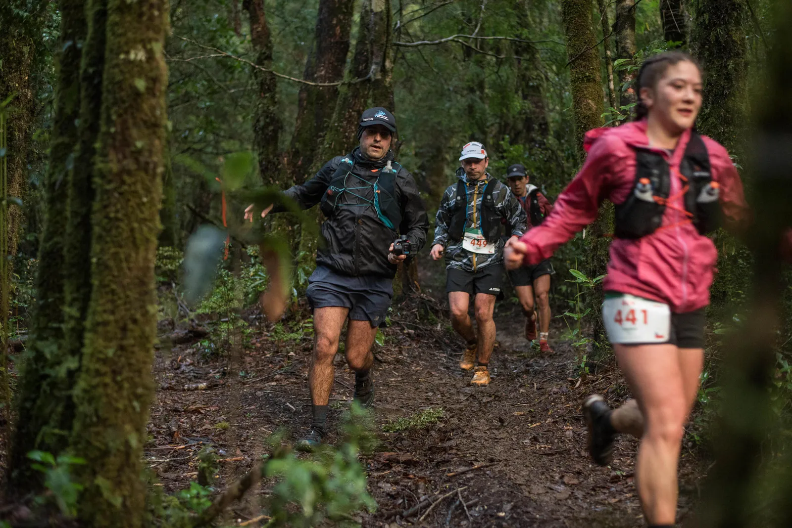 Image may contain Path Nature Outdoors Trail Person Adult Clothing Hat Footwear Shoe Shorts Coat and Jacket