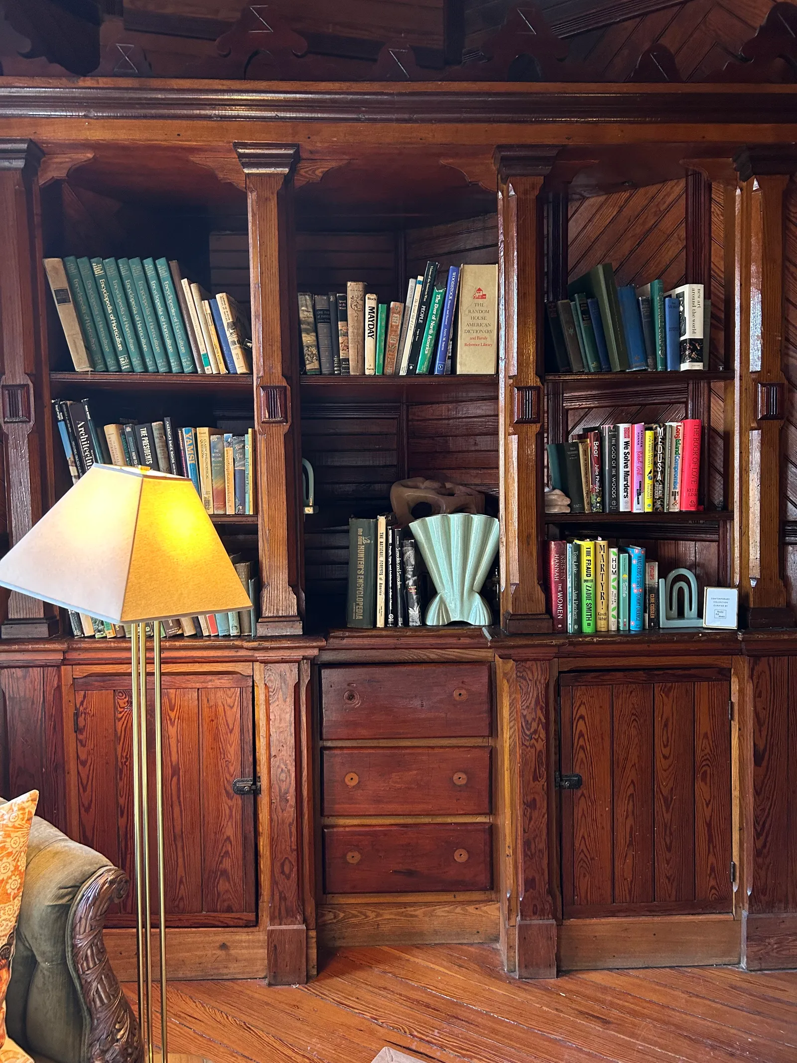 Image may contain Furniture Wood Hardwood Stained Wood and Bookcase