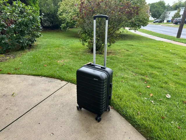 Image may contain: Baggage, Suitcase, and Person