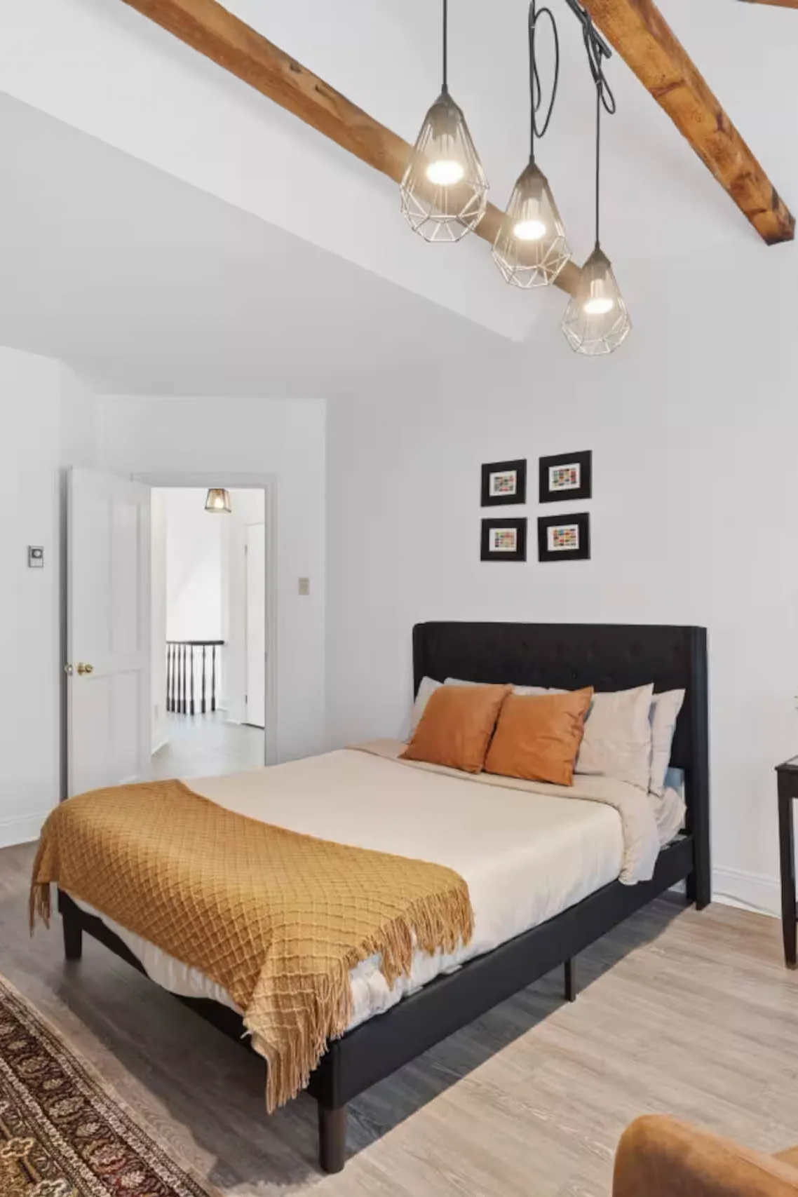 Image may contain Indoors Interior Design Home Decor Furniture Plant and Bed