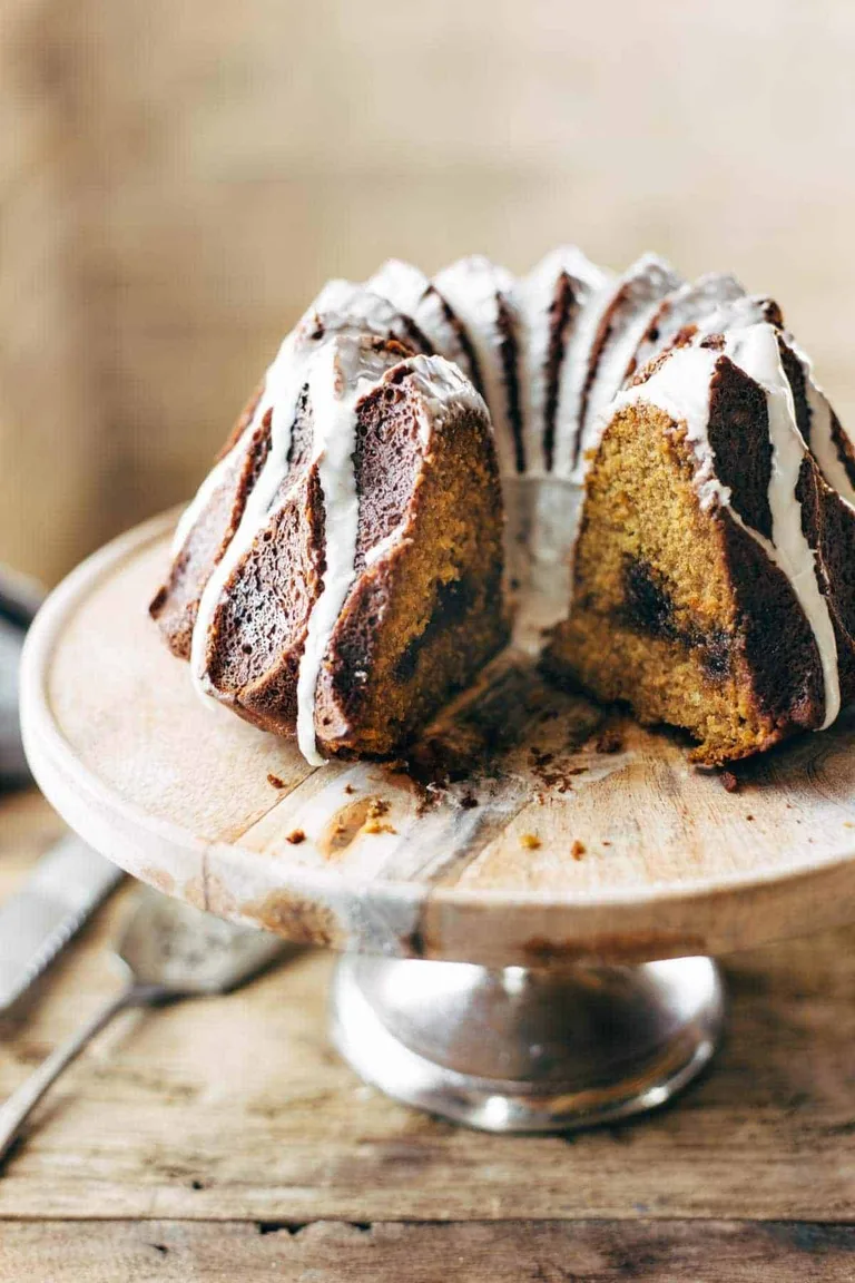 Pumpkin bundt cake on a tray.