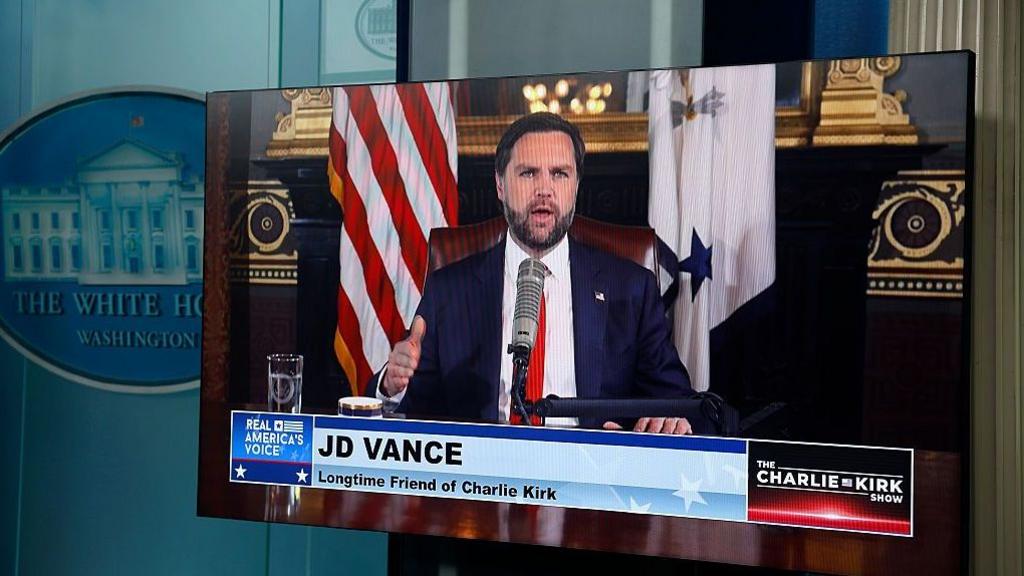 A video feed is displayed in the White House Briefing Room as U.S. Vice President JD Vance hosts a podcast episode of 'The Charlie Kirk Show' following the assassination of the show's namesake, at the White House on September 15, 2025 in Washington, DC.