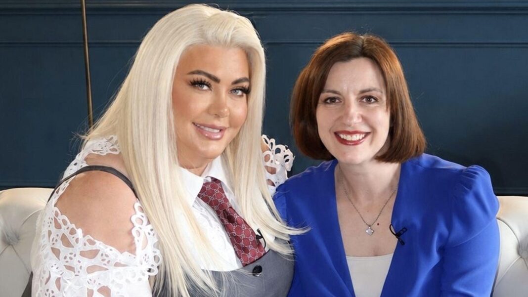 Gemma Collins in red tie and white lace top meeting Education Secretary Bridget Phillipson in a blue jacket, to discuss education reforms.