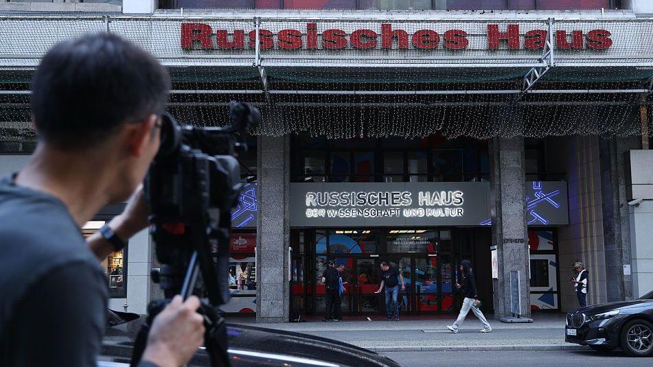 A television reporter films Russian House of Science and Culture shortly after German Foreign Minister Johann Wadephul announced Germany's response to the failed drone attack at Leipzig airport September 01, 2026 in Berlin